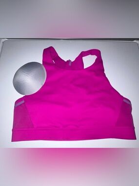 Brooks Women’s Hot Pink Racerback Sports Bra with three pockets